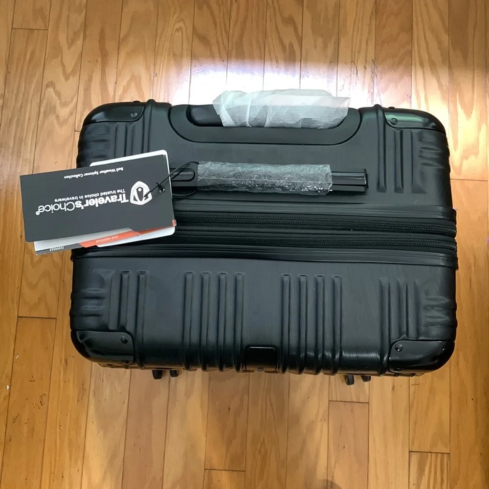 Traveler’s Choice Black Hard-case 24” Suitcase
